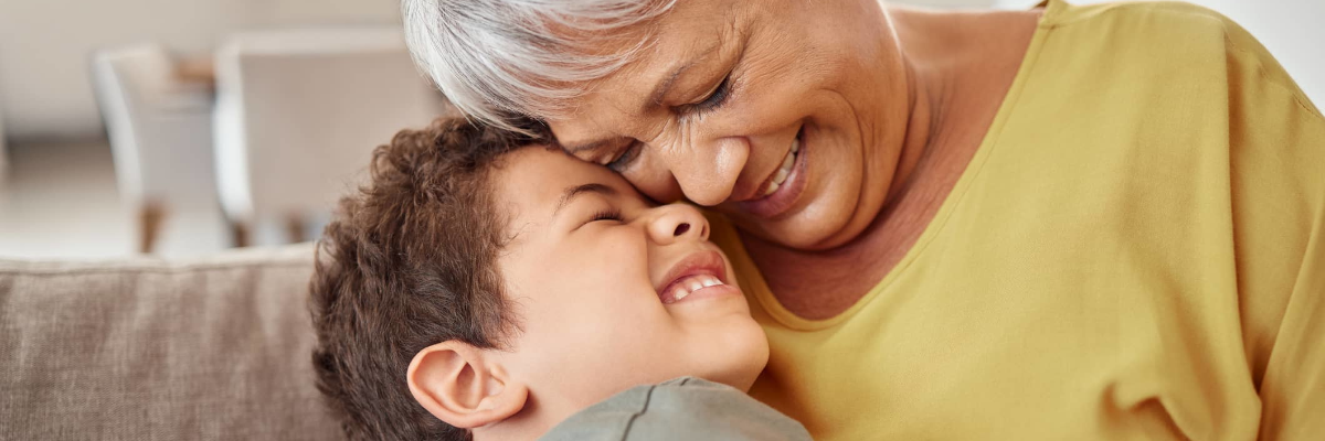 A Senior woman Hugging Her Grandson