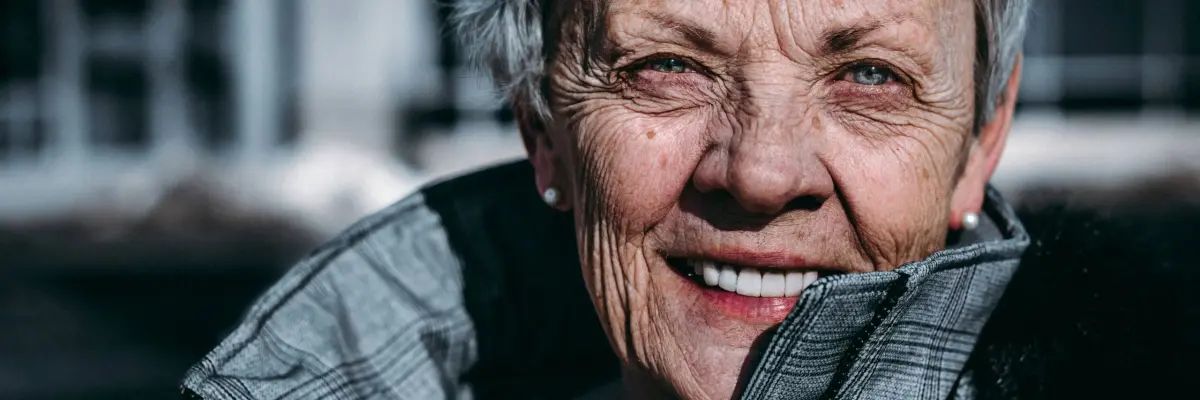 Older Woman Outdoors wearing a jacket